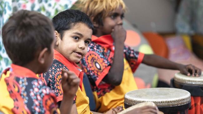 Students at Yipirinya School participating in a drumming program, led by Peter Lowson. Picture: Nico Liengme