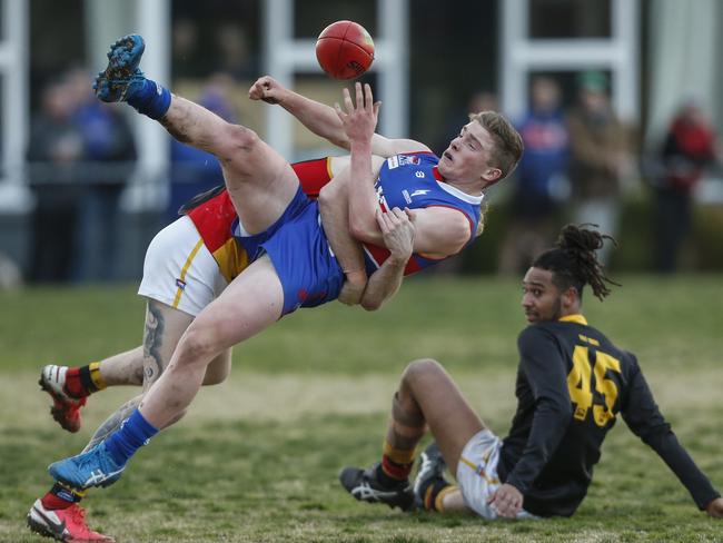 Matthew O'Brien marks for the Doggies. Picture: Valeriu Campan