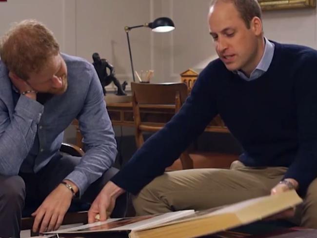 Princes William and Harry look at old pictures of their mother as they speak about her death 20 years on. Picture: Supplied