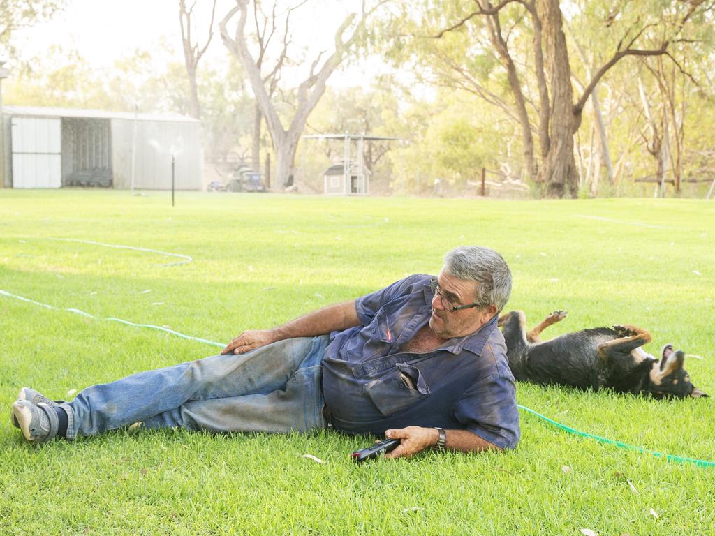 Stuart Lelievre lays on his small patch of grass on January 16, 2019 in Louth, Australia. Lelievre likens his patch of lawn to a safe house. After working in extreme heat and dust all day it is crucial for the family's well being to be able to come home and relax in a nice space. Local communities in the Darling River area are facing drought and clean water shortages as debate grows over the alleged mismanagement of the Murray-Darling Basin. Recent mass kills of hundreds of thousands of fish in the Darling river have raised serious questions about the way WaterNSW is managing the lakes system, and calls for a royal commission. (Photo by Jenny Evans/Getty Images)