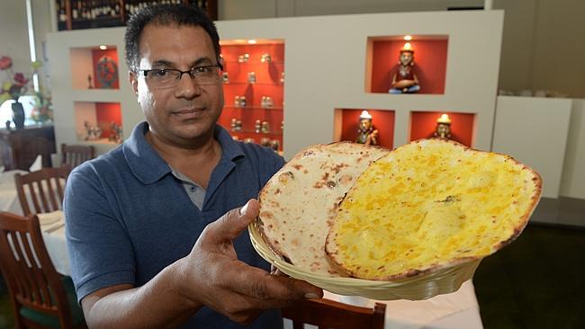 Narre Warren South Arya Indian restaurant owner and head chef Bhupinder Singh with the gl