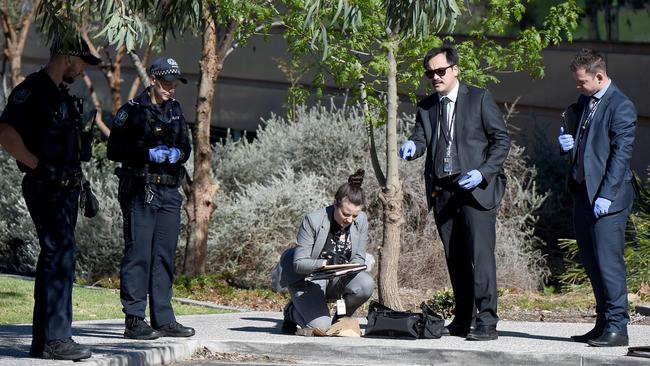 Police at Adelaide High School on West Terrace after a man was left in a critical condition after being assaulted. Picture: Naomi Jellicoe