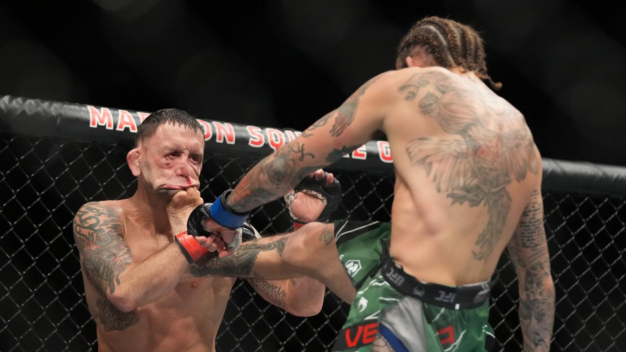Marlon Vera kicks Frankie Edgar in their Bantamweight fight during UFC 268. Photo by Louis Grasse/PxImages/Icon Sportswire via Getty Images.