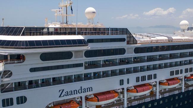 Four passengers have died aboard a cruise ship carrying scores of people with flu-like symptoms that has been stranded off the Pacific coast of South America for several days.