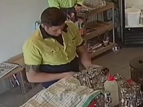 CCTV footage shows the scammers manipulating the machine while the unwitting staff watch on.