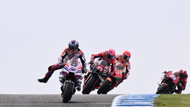 Prima Pramac's Spanish rider Jorge Martin (L) leads the pack during the second free practice session of the MotoGP Australian Grand Prix at Phillip Island on October 21, 2023. (Photo by WILLIAM WEST / AFP) / -- IMAGE RESTRICTED TO EDITORIAL USE - STRICTLY NO COMMERCIAL USE --