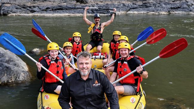 More than six months after Far North Queensland's worst flood on record, the Cairns Adventure Group has recommenced white water rafting tours on the Barron River. Cairns Adventure Group owner and operator Roderic Rees sits with tourists Jasmine Talbot, Mitchell Talbot, Zoe Zhou, instructor Carlos Van Horck, Xin Wu, Jacob Talbot and Pete Talbot as the rafts return to the river in the Barron Gorge. Picture: Brendan Radke