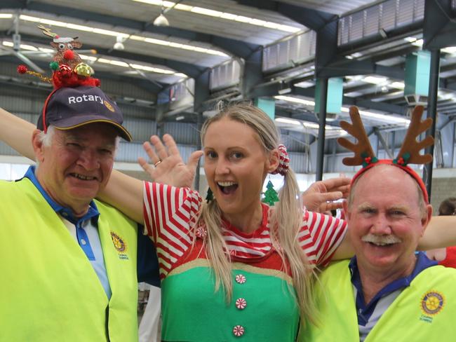 Rotary Club of Cairns Sunrise president Peter Sexton, Cairns Regional Council's Kahlia Pepper and fellow Rotarian Col Lawson at Fred Moule Pavilion in Cairns on Tuesday.