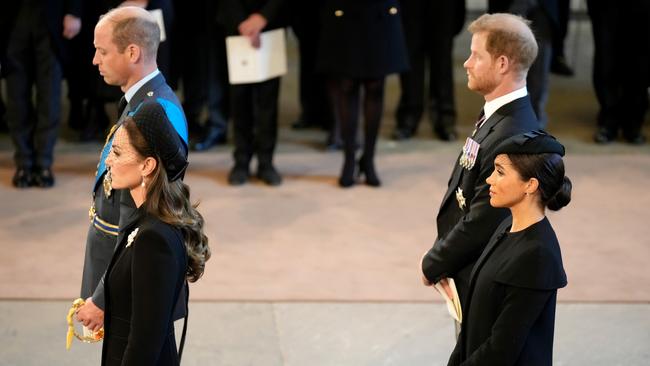 Catherine, Princess of Wales, Prince William, Prince of Wales, Meghan, Duchess of Sussex and Prince Harry, Duke of Sussex pay their respects in The Palace of Westminster. (Photo by Christopher Furlong/Getty Images)