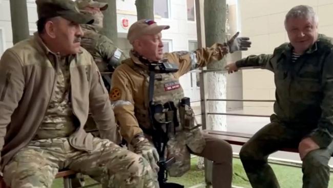 Yevgeny Prigozhin (C) speaks with Lieutenant General Vladimir Alekseev (R) and Russian Defende Deputy Minister Yunus-Bek Evkurov in Rostov-on-Don. Picture: AFP.