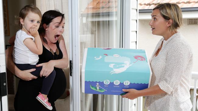 North Balgowlah mum Monqiue Treder has launched a new business where people can send meals instead of flowers. It is aimed in particular for families that just had a new baby. Pregnant Rachel Keeling and her daughter Lily, 2, is receiving a box of meals from Monique.