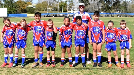 The Redbank Plains under-9 rugby league team with coach Luke Moriarty. Picture: Gary Reid