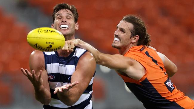 Tom Hawkins’ Cats are set to face Phil Davis’s Giants on Friday night.