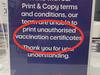The sign told customers they were not allowed to print false certificates.