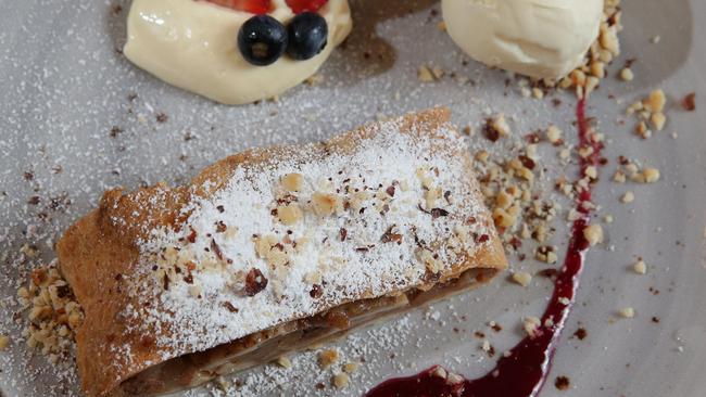 Homemade apple struel with vanilla sauce and ice cream. Photo: Adam Ward