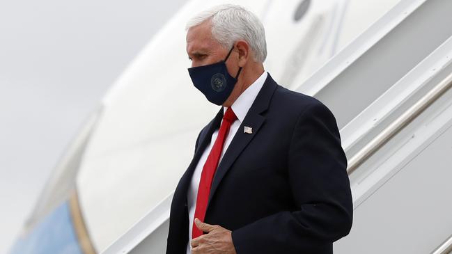 Vice President Mike Pence, pictured wearing a mask, urged other Americans to do the same. Picture: AP