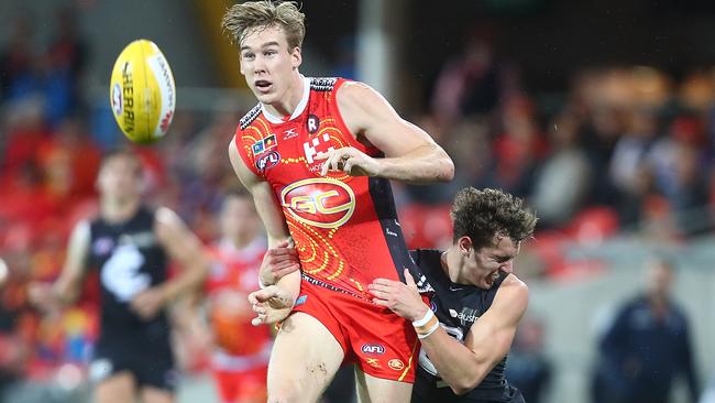 Tom Lynch wins a rare possession on Saturday night.