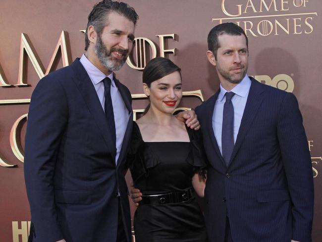 Winning team ... Emilia Clarke, centre, with the creators and executive producers of Game of Thrones, David Benioff, left, and Dan Weiss. Picture: George Nikitin, Invision/AP