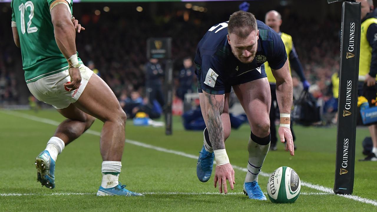 Stuart Hogg of Scotland drops the ball over the line resulting in no try.