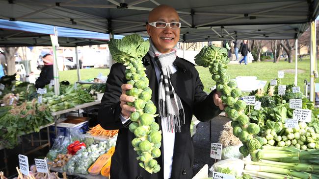 celebrity Hong Kong chef Wong Wing Chee with some brussels sprouts at the Salamanca Market in Hobart