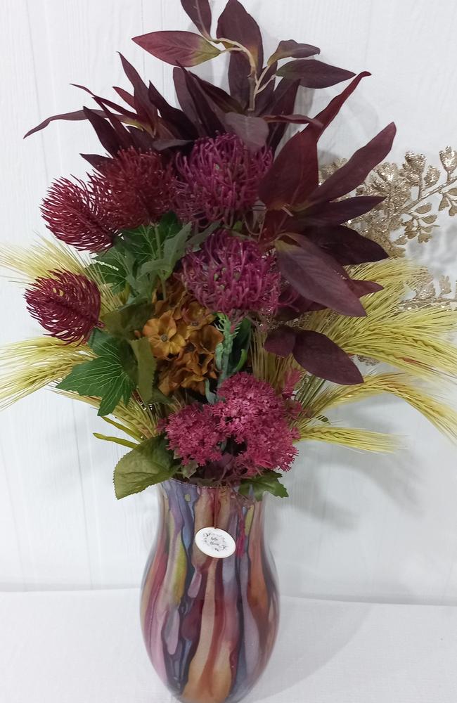 An arrangement from Bella Infinity Blooms.