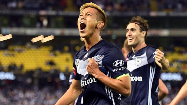 Keisuke Honda celebrates after scoring his goal. Picture: AFP Photo