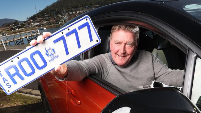 Russell Hanson of Lindisfarne with one of his personalised plates he is looking to sell. Picture: Zak Simmonds