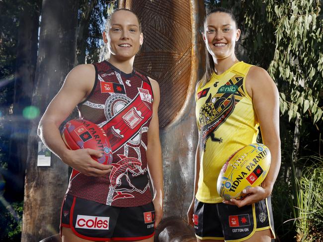 Richmond; s Maddie Shelvin and Essendon’s Steph Cain in their clubs’ indigenous jumpers. Picture: Michael Klein