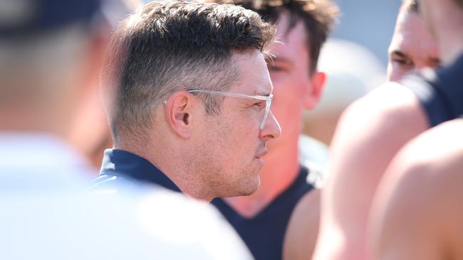 ADELAIDE, AUSTRALIA - APRIL 06: Zane Littlejohn, Coach of Victoria addresses his team during the 2024 AAMI State Game between SANFL West End State Team and Smithy's VFL State Team at Glenelg Oval, on April 06, 2024, in Adelaide, Australia. (Photo by Maya Thompson/AFL Photos/via Getty Images)