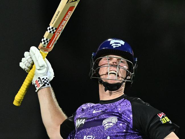 HOBART, AUSTRALIA - JANUARY 27: Mitch Owen of the Hurricanes celebrates scoring a century during the BBL The Final match between Hobart Hurricanes and Sydney Thunder at Ninja Stadium on January 27, 2025 in Hobart, Australia. (Photo by Steve Bell/Getty Images)