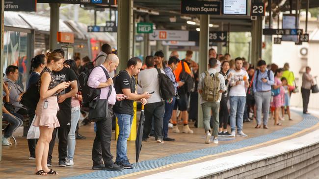 Commuters wait at Central Station. Picture: AAP