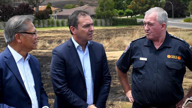 TOUGH TIMES: Premier Steven Marshall visits a burnt out area in Woodside with the Governor Hieu Van Le, CFS Chief Mark Jones. Picture Tricia Watkinson