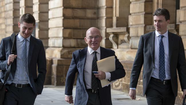 Justice Action co-ordinator Brett Collins (centre) pictured outside court with his lawyers after winning a legal victory – allowing publication of a pre-election newspaper in SA prisons. Picture: Naomi Jellicoe