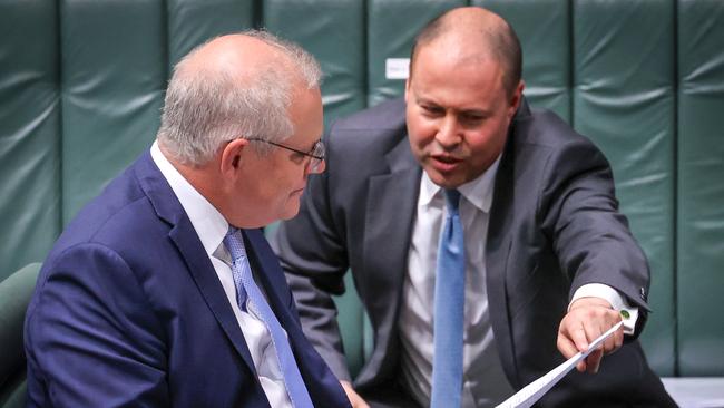 Prime Minister Scott Morrison talks with Treasurer Josh Frydenberg during Question Time in the House of Representatives at Parliament House on September 3. Picture: Getty Images