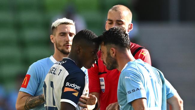 Angel Torres Quinones of the Mariners and Tolgay Arslan of Melbourne City have a disagreement during the A-League Men round eight match between Melbourne City and Central Coast Mariners at AAMI Park, on December 17, 2023, in Melbourne, Australia. (Photo by Quinn Rooney/Getty Images)