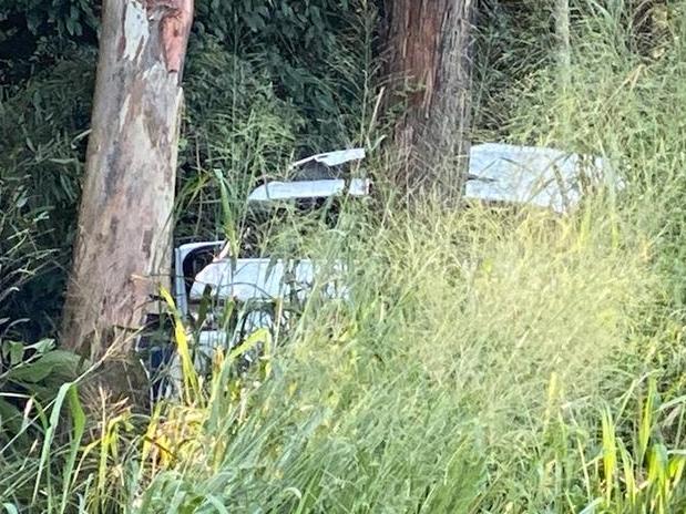 The Range Rover in bushland after the crash