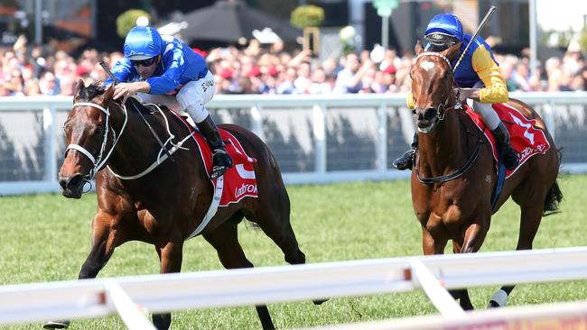 Winx cruised past Black Heart Bart in the run to the line. Picture: Mark Dadswell