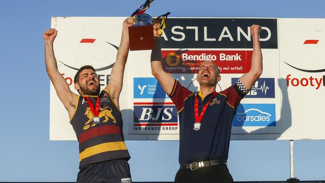 Batsanis and Buckle lift the 2019 Division 1 cup for Doncaster East. Picture: Valeriu Campan