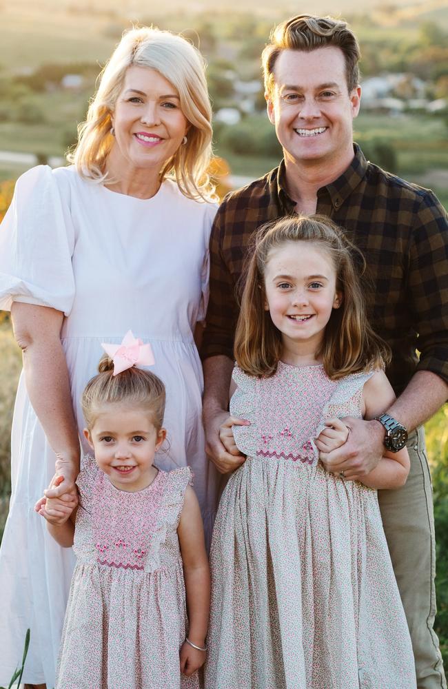 The Denyer family — Grant and Chezzi with daughters Sailor and Scout — before the new addition.