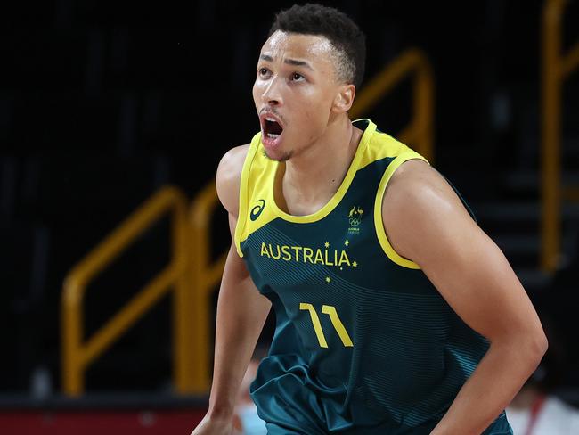 SAITAMA, JAPAN - AUGUST 07: Dante Exum #11 of Team Australia celebrates against Team Slovenia during the second half of the Men's Basketball Bronze medal game on day fifteen of the Tokyo 2020 Olympic Games at Saitama Super Arena on August 07, 2021 in Saitama, Japan. (Photo by Kevin C. Cox/Getty Images)