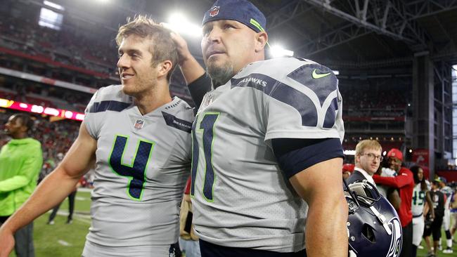 Kicker Sebastian Janikowski and Michael Dickson  celebrate another Seahawks win.