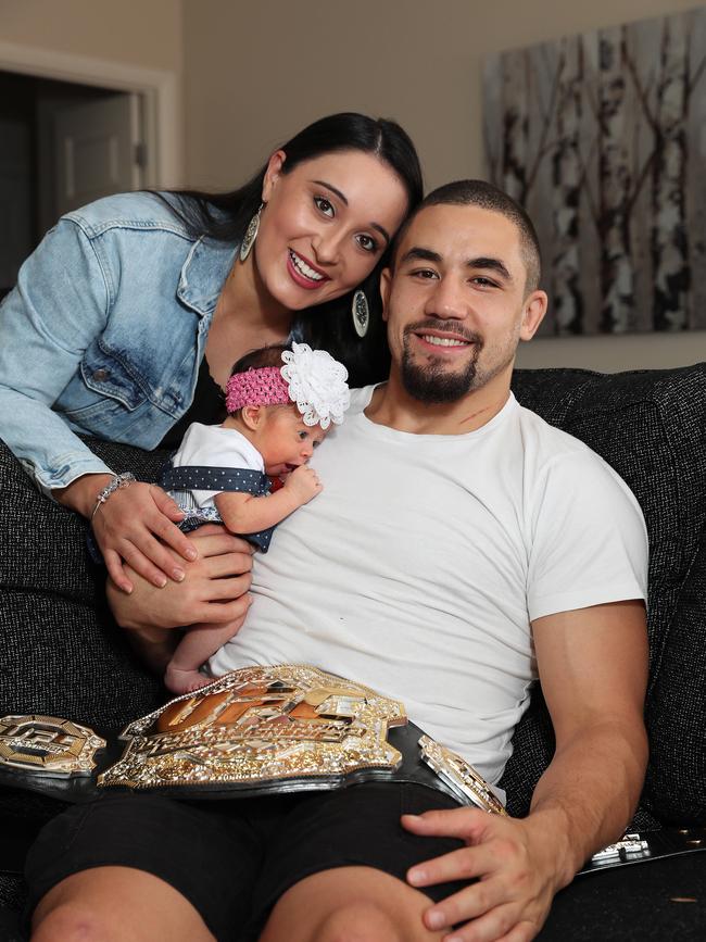 Whittaker with his family. Picture: Brett Costello