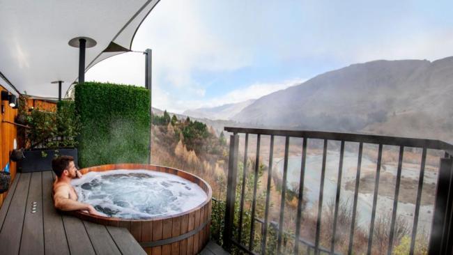 Soak up the sights at Onsen Hot Pools in Queenstown.