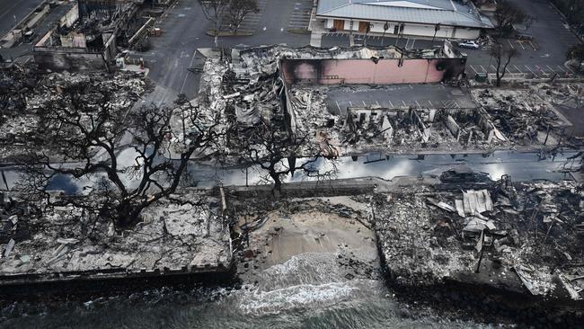 An aerial image taken on August 10, 2023 shows destroyed homes and buildings on the waterfront burned to the ground in Lahaina. Picture: AFP