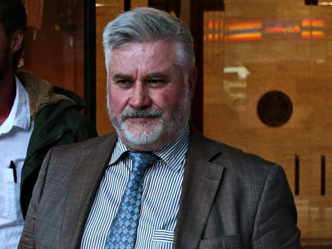 SYDNEY, AUSTRALIA - NewsWire Photos JULY 8:  Former Financial advisor Graeme Miller (centre) leaving the Downing center court in Sydney. PICTURE: NCA NewsWire/Adam Yip