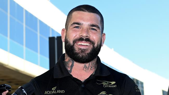 South Sydney halfback Adam Reynolds was all smiles at Brisbane Airport. Picture: Bradley Kanaris/Getty