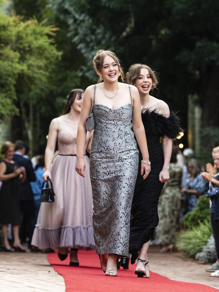 Bianca Wilson leads her friends as they arrive Fairholme College formal, Wednesday, March 29, 2023. Picture: Kevin Farmer