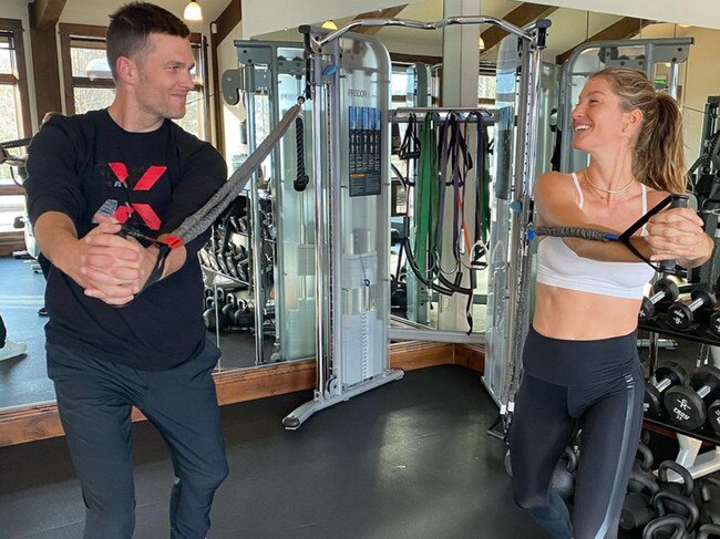 Tom Brady works out with wife Gisele.