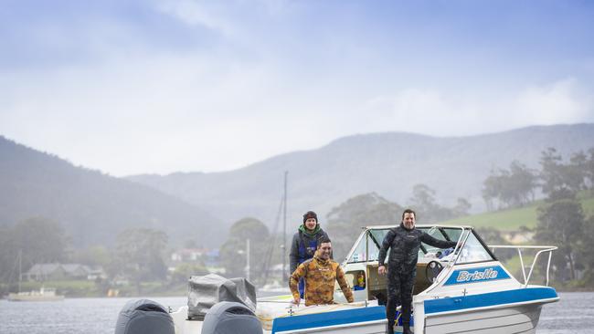 Abalone fishermen Nathan Clark Aaron Dance and Daniel Walter onboard their Commercial abalone vessel Bristle in Port Cygnet, SE Tasmania. Picture: Richard Jupe