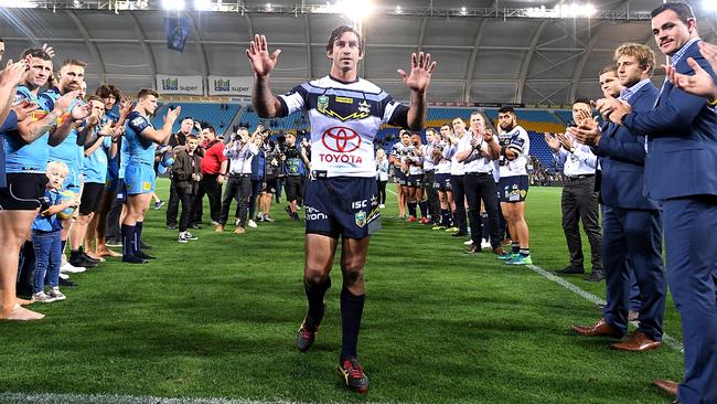 Johnathan Thurston farewells fans as he celebrates his last NRL match. Picture: Bradley Kanaris